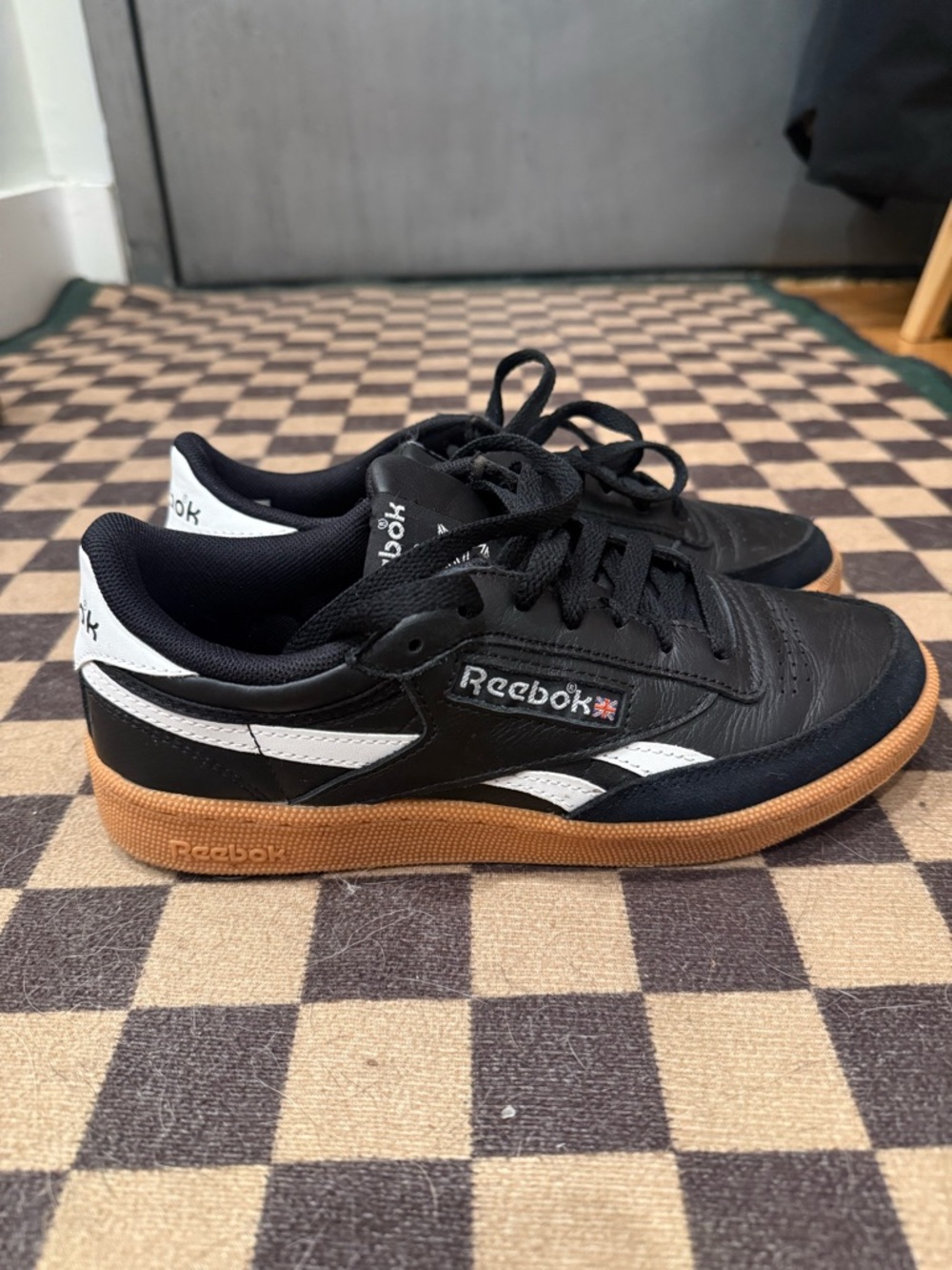 Reebok Men's Black Leather Sneakers with White Accents and Gum Sole